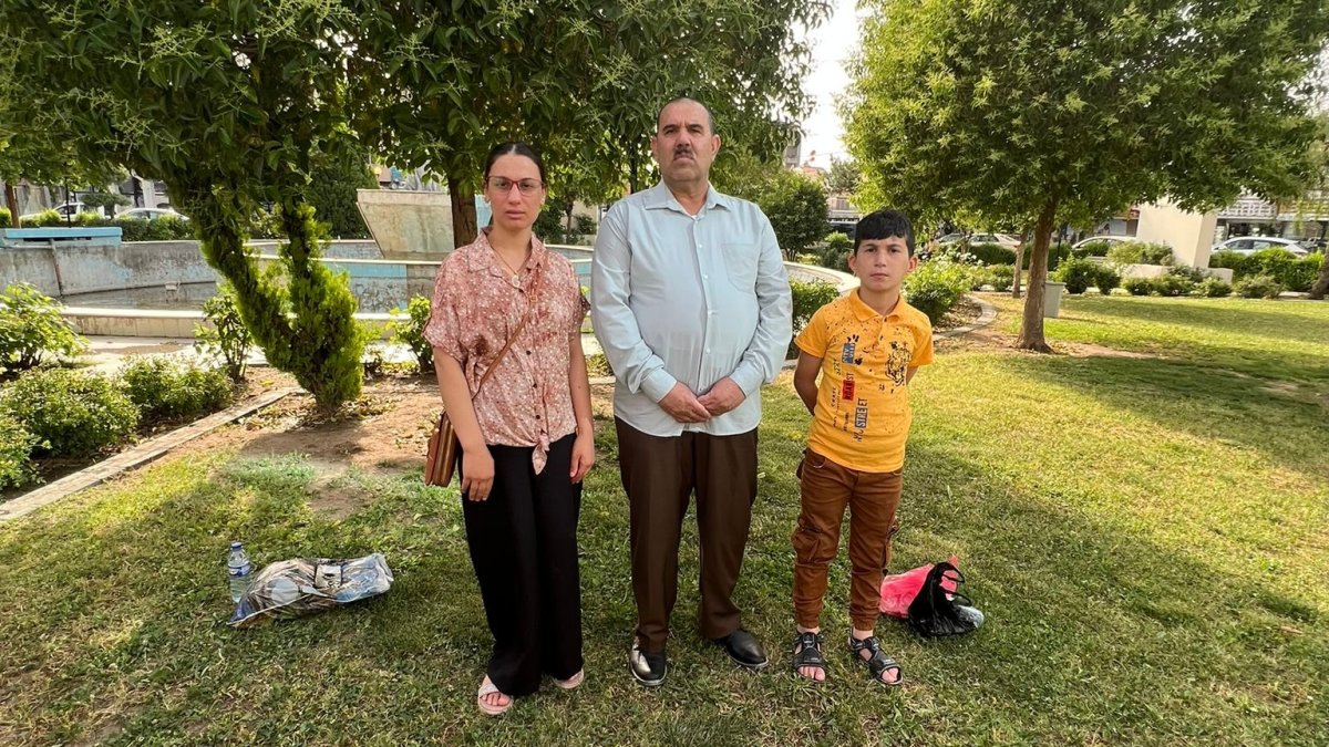 Ali Bashar, centre, survived an ISIS mass execution and now lives in Calgary.