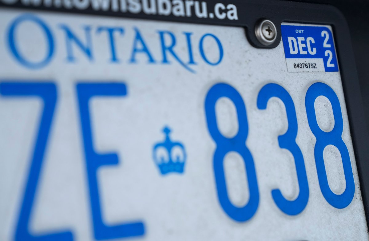 A photograph of an Ontario provincial licence plate with a renewal sticker is shown in Mississauga, Ont., on Tuesday, February 22, 2022. The Ontario government is scrapping licence plate renewal fees and corresponding stickers for passenger vehicles, light duty trucks, motorcycles and mopeds. 