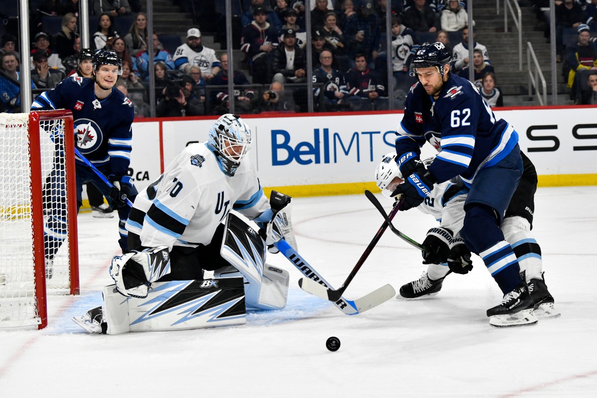 Winnipeg Jets' Nino Niederreiter (62) gets ready to take a shot on Utah Hockey Club goaltender Karel Vejmelka (70) during the second period of their NHL hockey game in Winnipeg, Tuesday November 5, 2024. THE CANADIAN PRESS/Fred Greenslade.