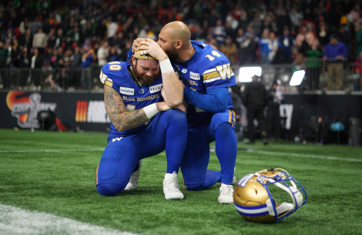 Winnipeg Blue Bombers kicker Sergio Castillo (14) and teammate Mike Benson (40) show their disappointment after losing the 111th Grey Cup to the Toronto Argonauts, n Vancouver, B.C., Sunday, Nov. 17, 2024. THE CANADIAN PRESS/Ethan Cairns.