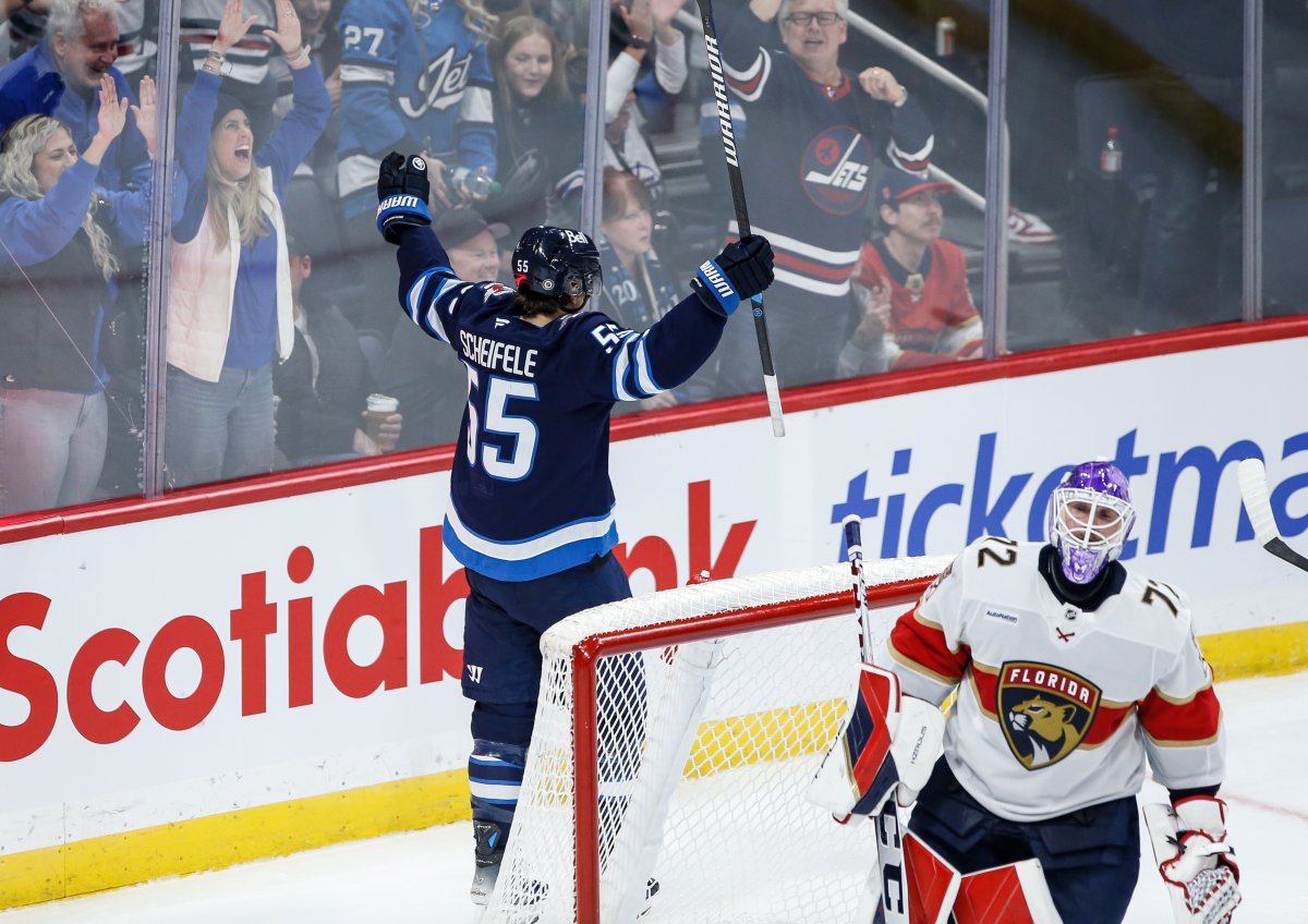 Winnipeg Jets' Mark Scheifele (55) celebrates his goal against Florida Panthers goaltender Sergei Bobrovsky (72)  during first period NHL action in Winnipeg, Tuesday, Nov. 19, 2024. THE CANADIAN PRESS/Fred Greenslade.