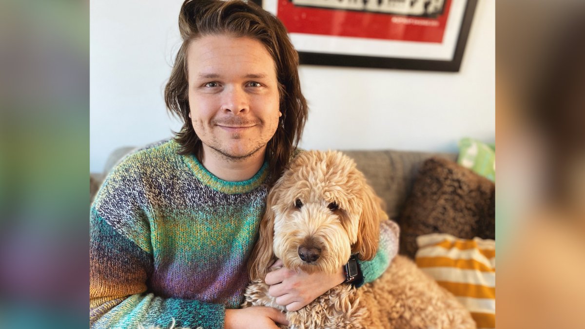 Adam Barrett of Halifax and his dog Percy are shown in a handout photo.