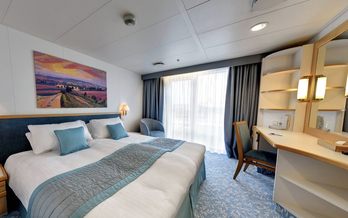 A view of a Deluxe Balcony room on the Villa Vie Odyssey.