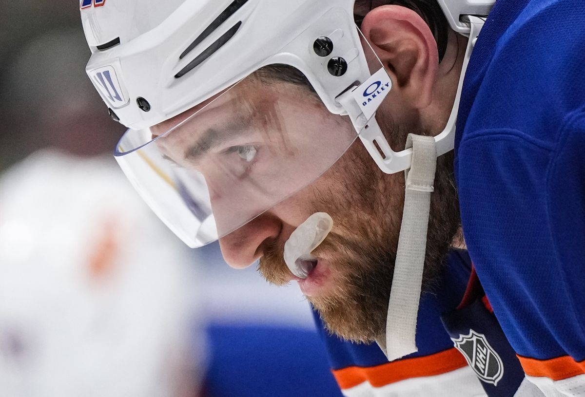 Edmonton Oilers' Leon Draisaitl prepares to take a faceoff during the second period of an NHL hockey game against the Vancouver Canucks, in Vancouver, on Saturday, November 9, 2024.