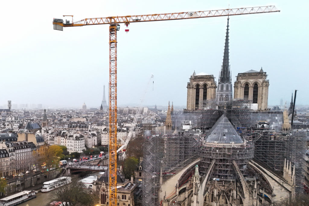 This aerial photograph shows a crane next to scaffoldings on Notre-Dame de Paris cathedral a few days before its reopening, on November 25, 2024.