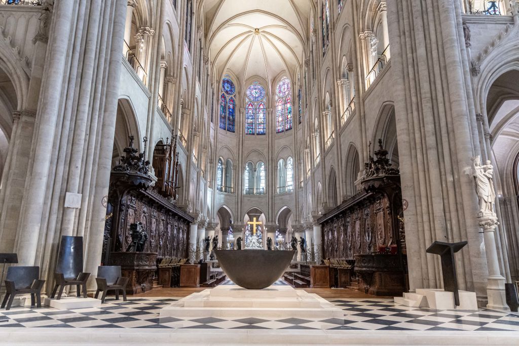 This photograph shows a new altar (front) designed by French artist and designer Guillaume Bardet, at the Notre-Dame de Paris cathedral, in Paris on November 29, 2024. The Notre-Dame Cathedral is set to re-open early December 2024, with a planned weekend of ceremonies on December 7 and 8, 2024, five years after the 2019 fire which ravaged the world heritage landmark and toppled its spire.