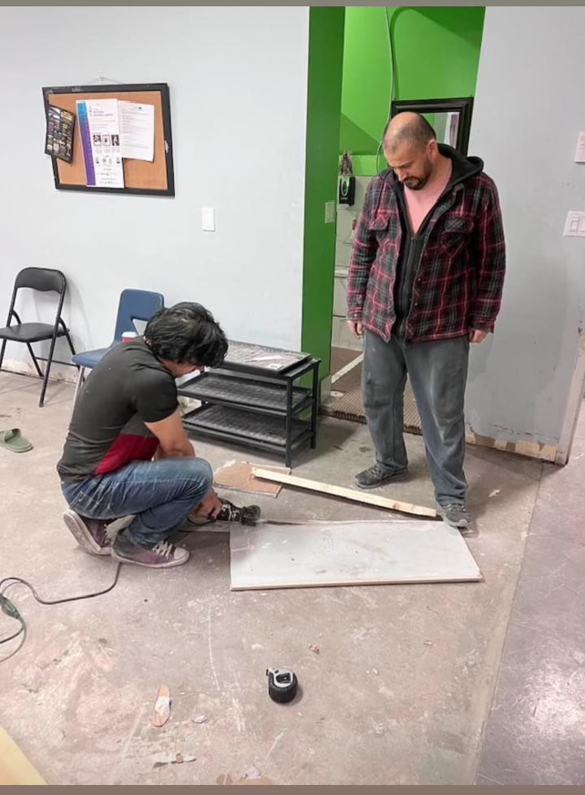 Friends describe Ahmad Khalid Ghulam Farooq as "the community handyman" who died doing what he always did, helping other people.