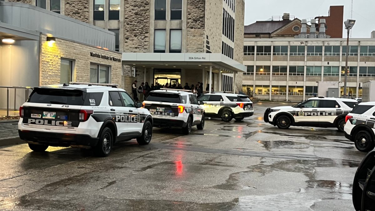 Police surround a building at the University of Manitoba after reports of an armed man. 