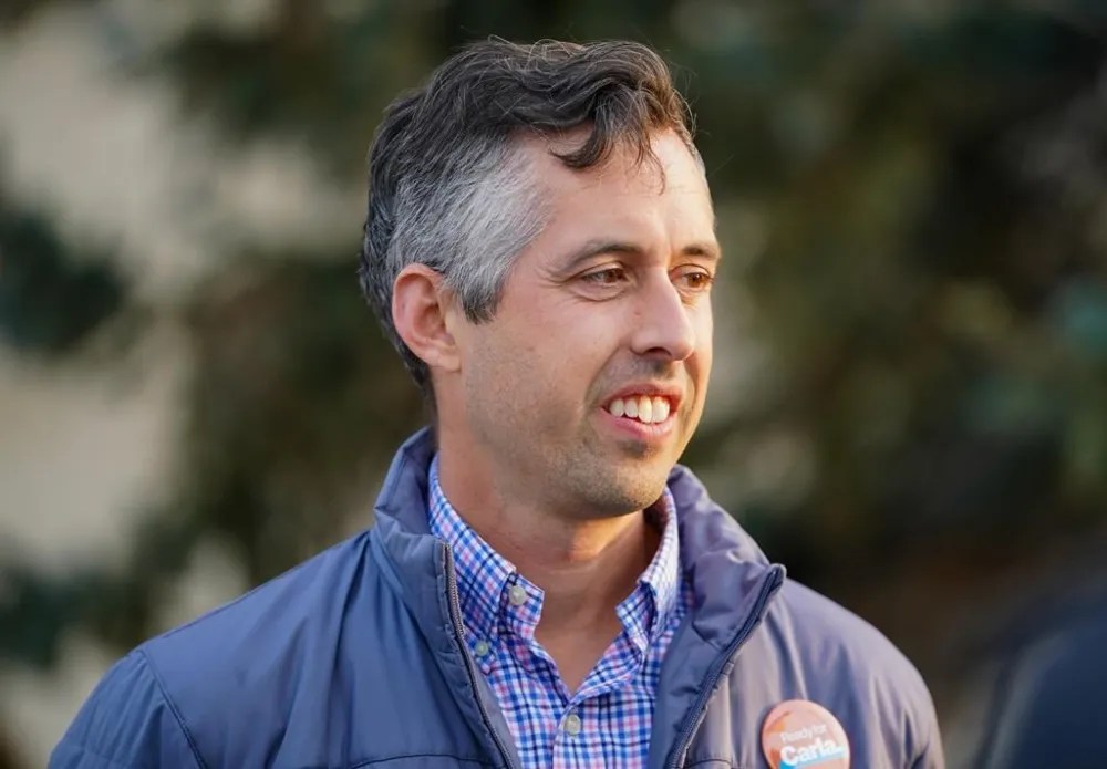 Jared Clarke, Saskatchewan NDP candidate for Regina Walsh Acres, looks on in Regina, Oct. 16.