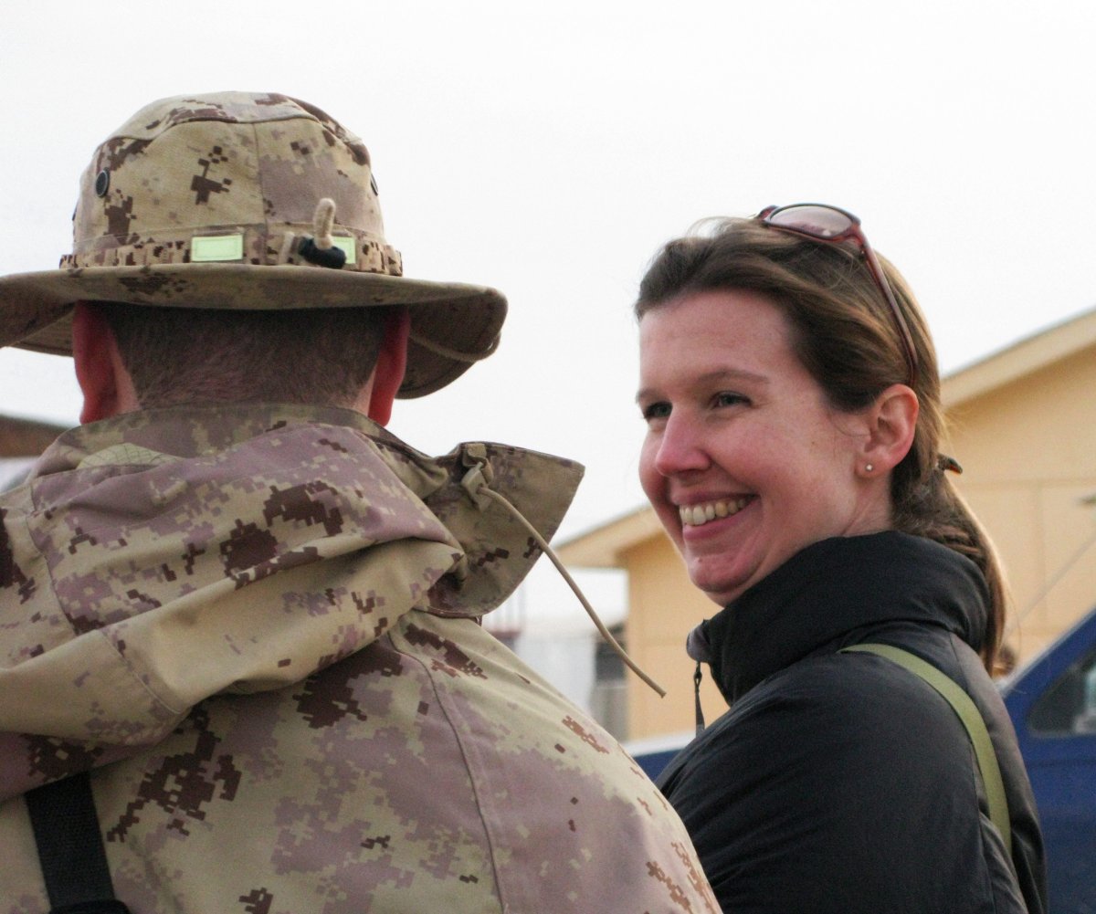 Calgary-based reporter Michelle Lang, 34, collects a season’s greeting from a Canadian soldier at Kandahar Airfield on Saturday, Dec. 12, 2009. Lang was killed along with four Canadian soldiers by an improvised explosive device on Wednesday, Dec. 30, 2009, the first Canadian journalist killed in Afghanistan.