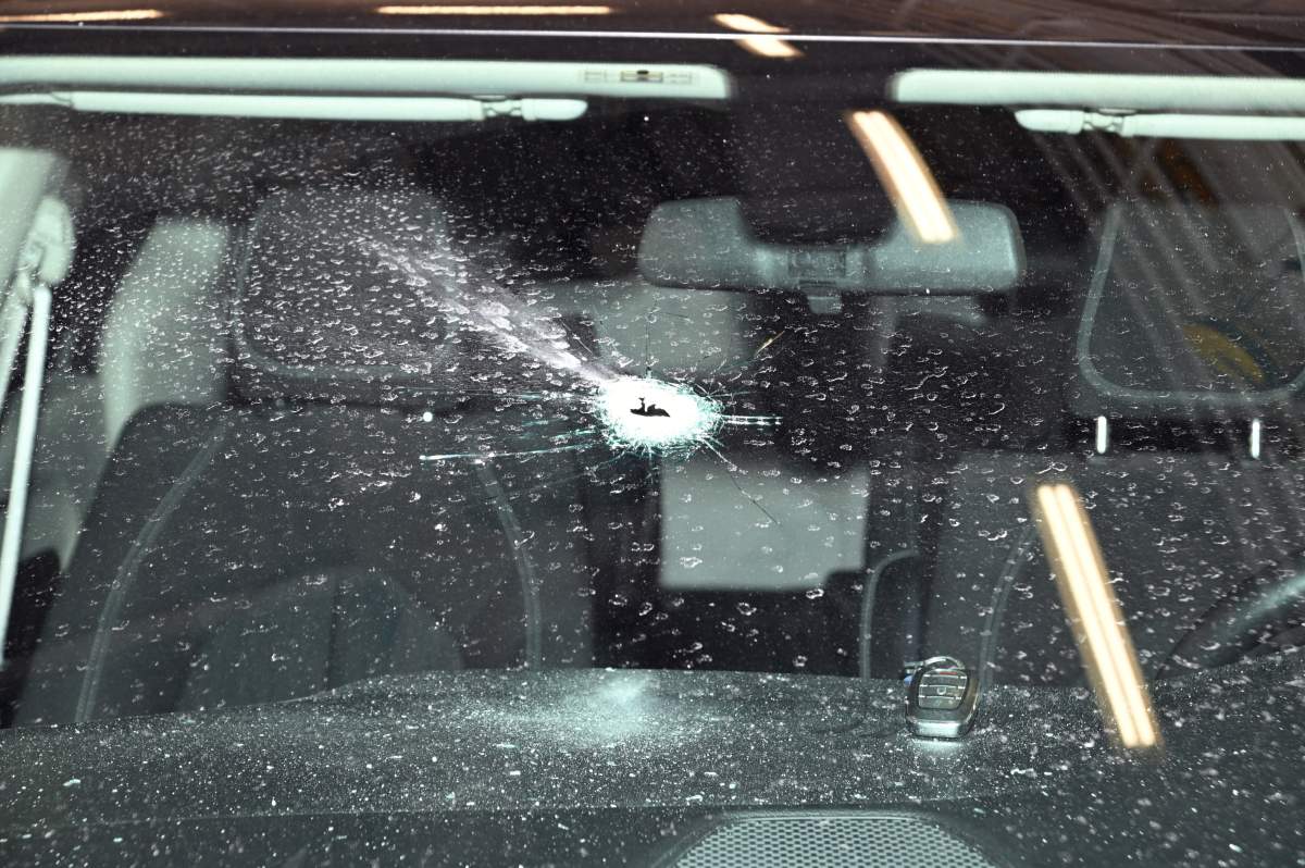 Bullet hole in the windshield of an unmarked Toronto police vehicle.