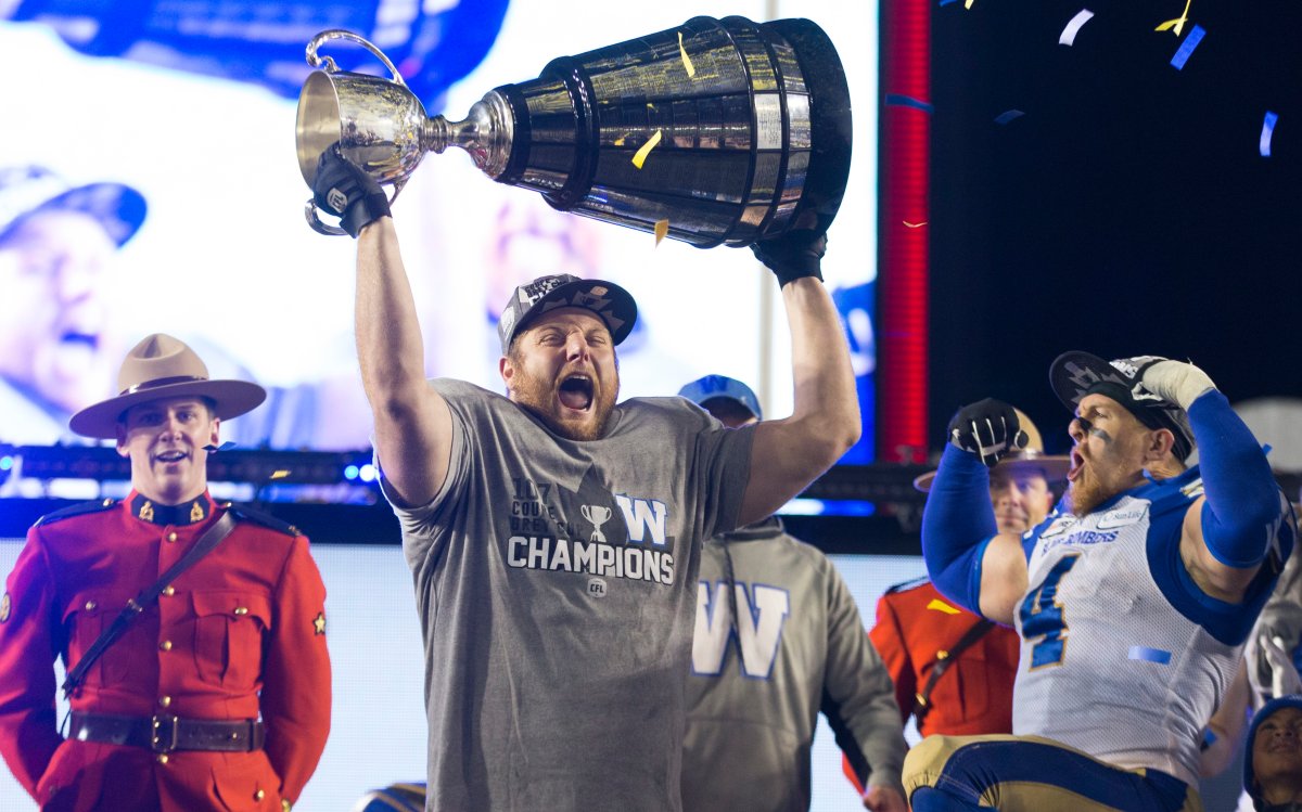 Winnipeg Blue Bombers' Jake Thomas celebrates winning the 107th Grey Cup against the Hamilton Tiger Cats in Calgary on November 24, 2019.