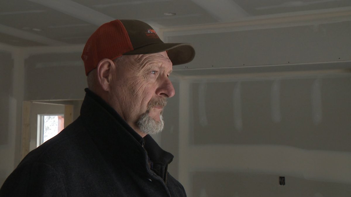 Brian Gardner inside the emergency shelter being built in Olds, Alberta, named in honour of his daughter Kirsten who was a victim of domestic violence.