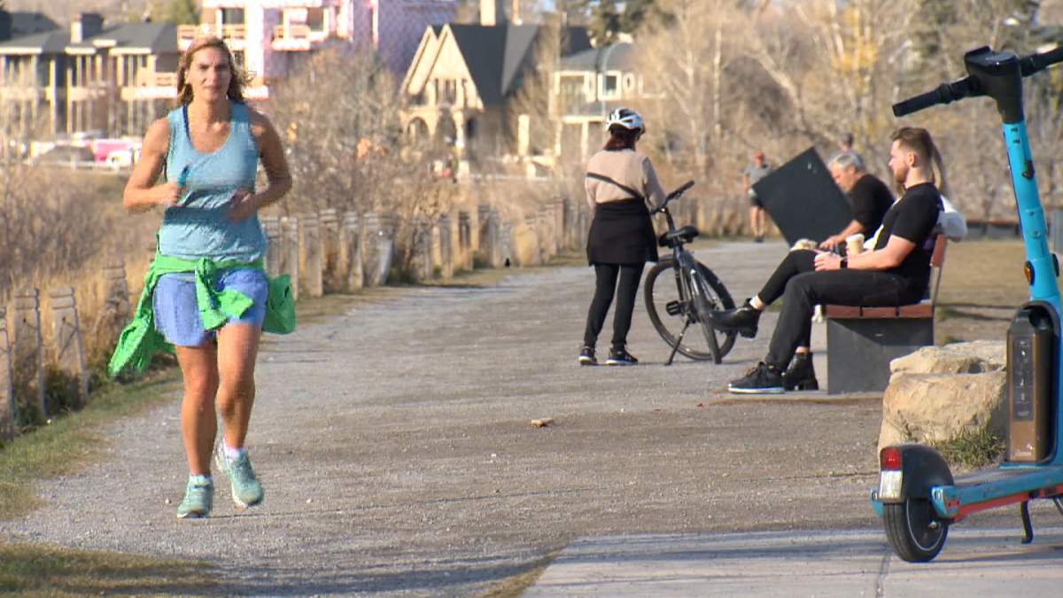 Environment Canada says an atmospheric river that has dumped heavy rains on B.C. is also responsible for the unseasonably warm temperatures blanketing much of southern Alberta.