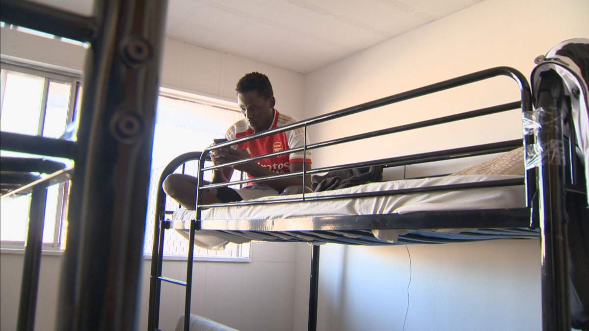 Kateregga Raymond Calvin fled Uganda and came to Canada, but he was forced out of his first home due to racist taunts from his neighbours.