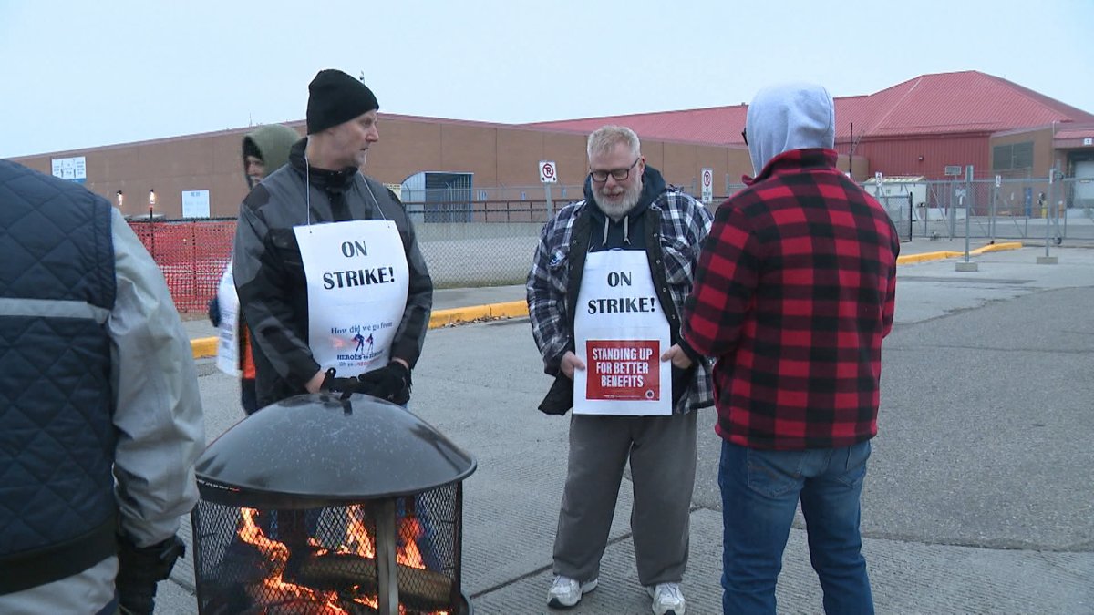 Members of the Canadian Union of Postal workers on the picket line in Calgary Friday morning (Nov. 15, 2024) shortly after a nationwide walkout began.