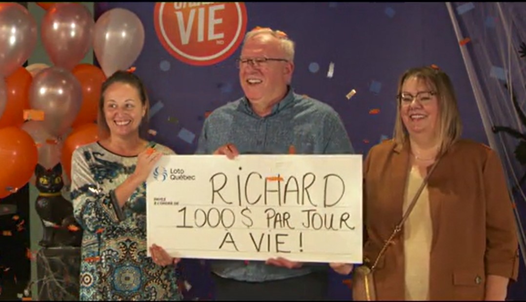 Richard Plante, middle, and wife Guylaine Talbot, right, celebrate their newfound fortunate on Oct. 31, 2024.