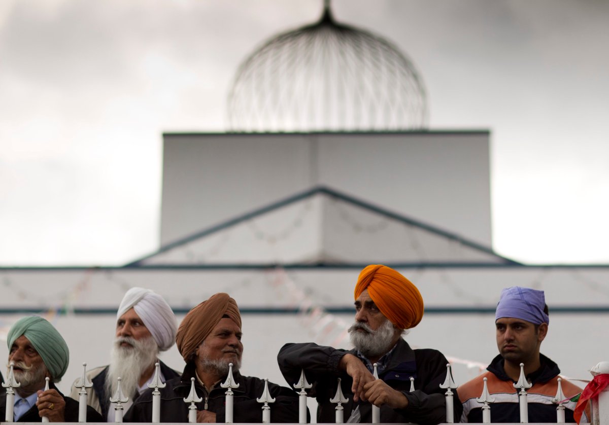 Sikhs at the Ross Street Temple watch the start of Vaisakhi parade in vancouver April 17, 2011.  