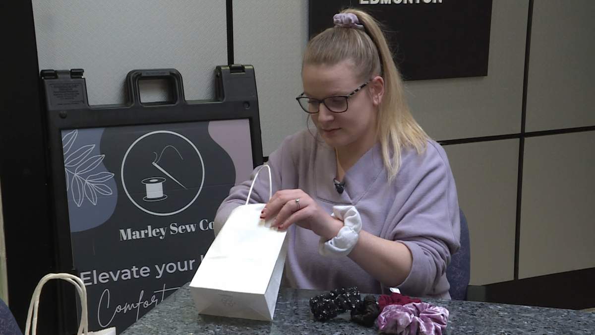 Marley Anne Clubine-Piggott, a small business owner from Edmonton, who sells hair scrunchies online says a strike by postal workers could be devastating for business.
