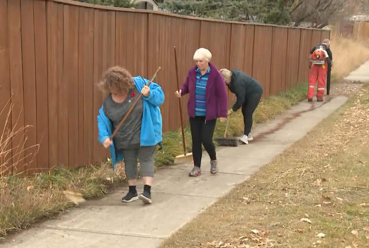 The volunteers, who first had to clean the sidewalk before painting it in honour of our veterans, say the project will be a permanent memorial to those who served.