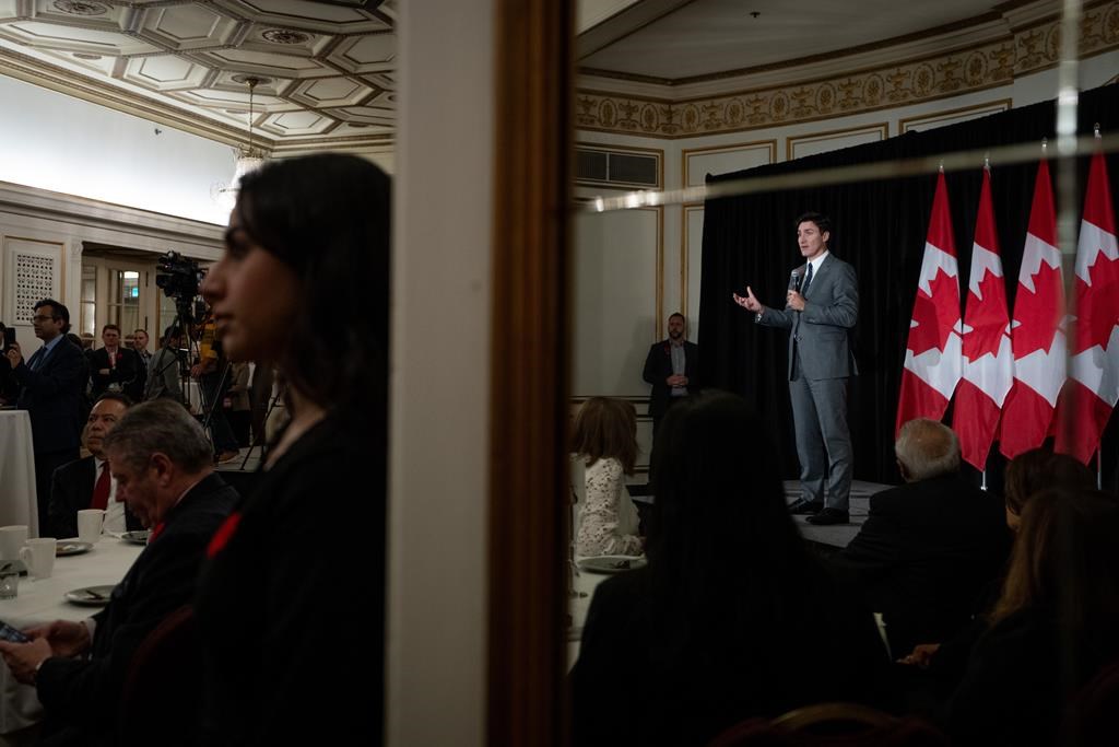 Voters in the Liberal-held B.C. riding of Cloverdale—Langley City go to the polls today to pick a new member of parliament, in another test for Prime Minister Justin Trudeau. Supporters listen as Trudeau speaks during a Liberal Party fundraising event in Vancouver, on Nov. 8, 2024. THE CANADIAN PRESS/Ethan Cairns.