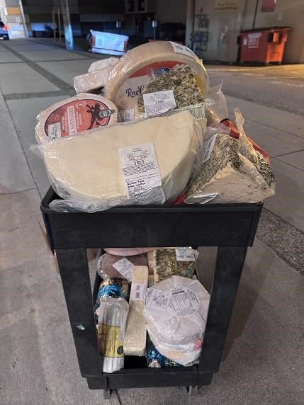 British Columbia business owner Joe Chaput will spend $5,500 a month during the holiday season on security guards and plans on upgrading his store's video security camera system at a cost of around $5,000. A cart full of cheese in a laneway is shown in North Vancouver in this image provided by the police. 