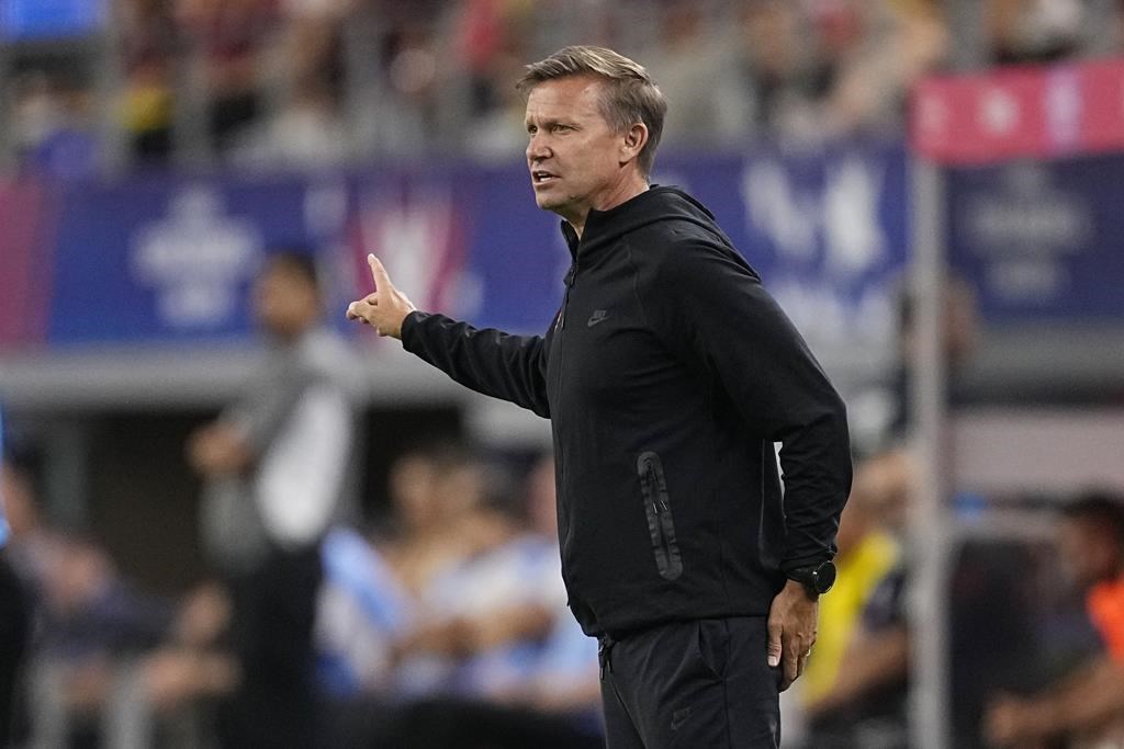 anada head coach Jesse Marsch signals to his players during a Copa America quarterfinal soccer match between Venezuela and Canada in Arlington, Texas, Friday, July 5, 2024.