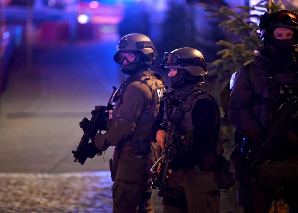 Special police forces attend an incident at the Christmas market in Magdeburg, Germany, Friday Dec. 20, 2024.