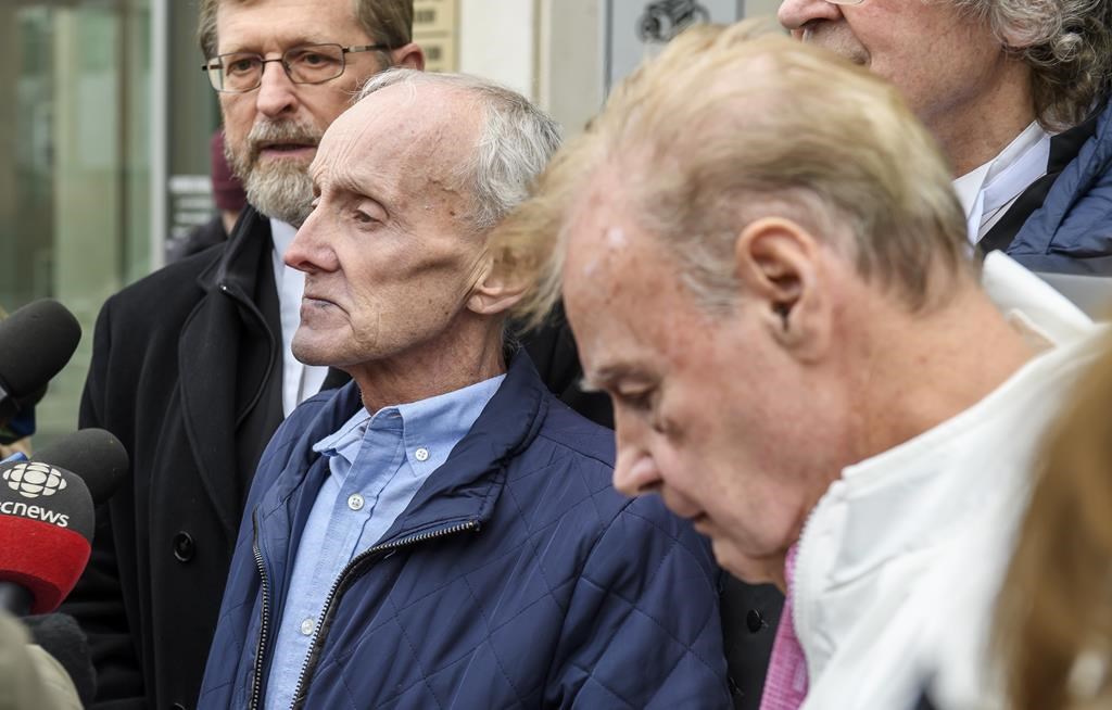 obert Mailman, left, and Walter Gillespie, speak to media shortly after their hearing at Saint John Law Courts in Saint John