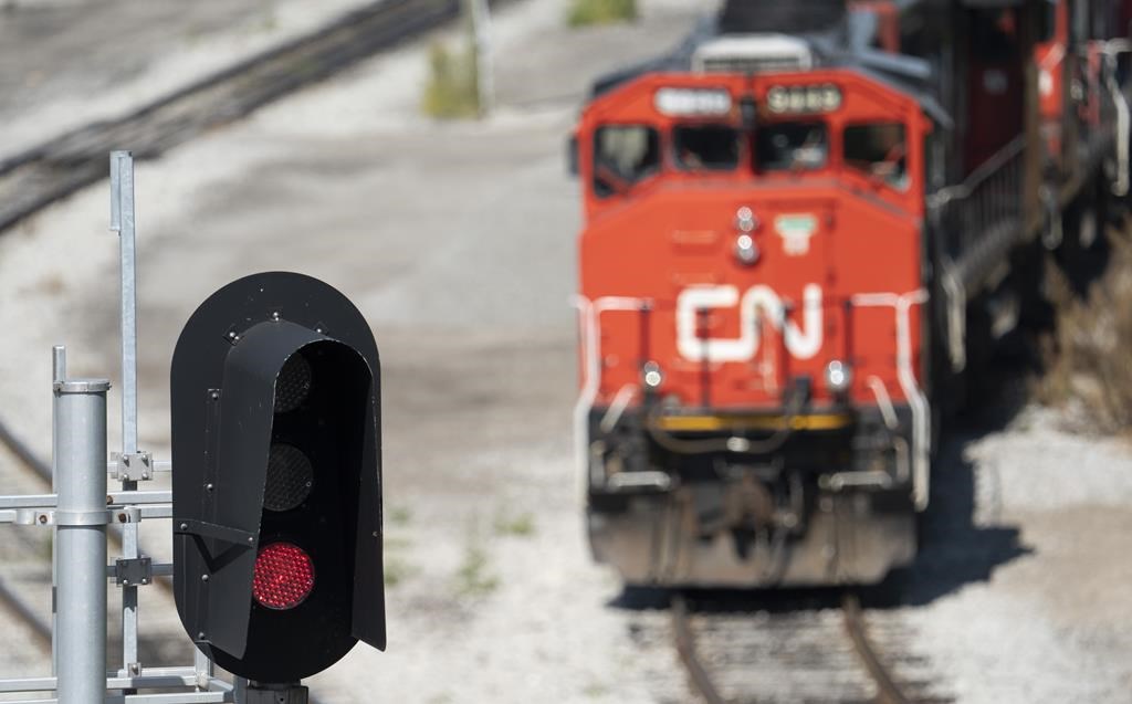 FILE - A CN locomotive sits idle in Hamilton, Ont., Thursday, Aug. 22, 2024. THE CANADIAN PRESS/Peter Power.