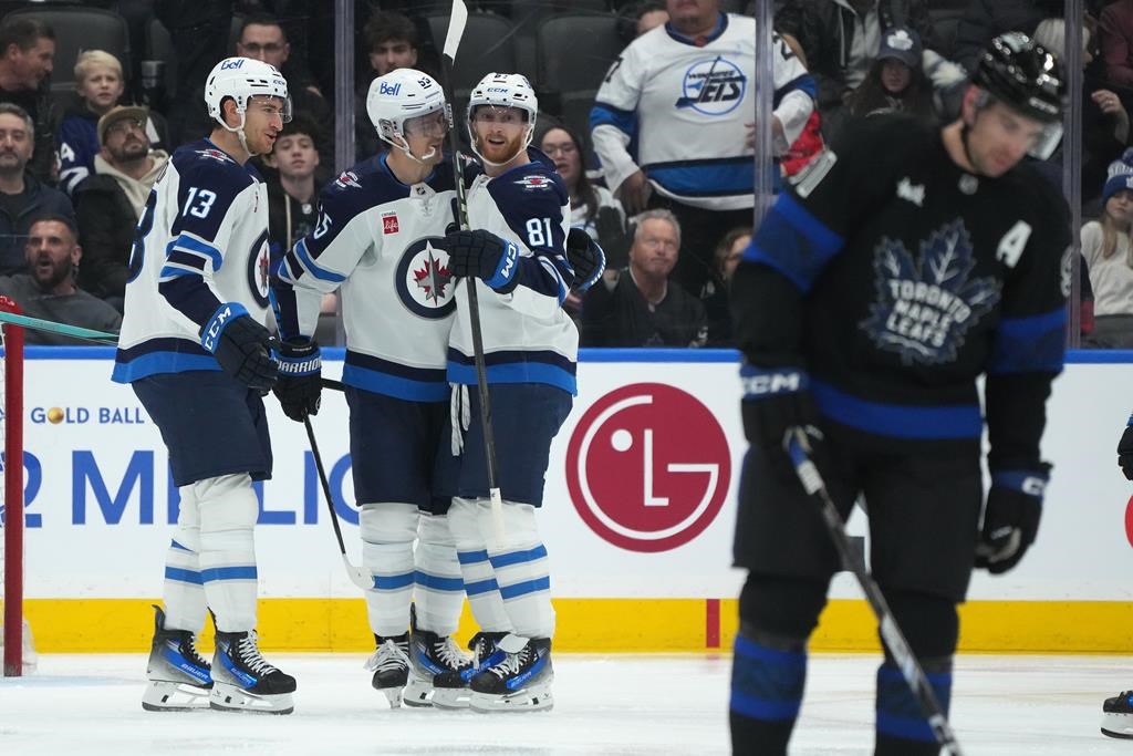 Winnipeg Jets celebrate goal against the Toronto Maple Leafs