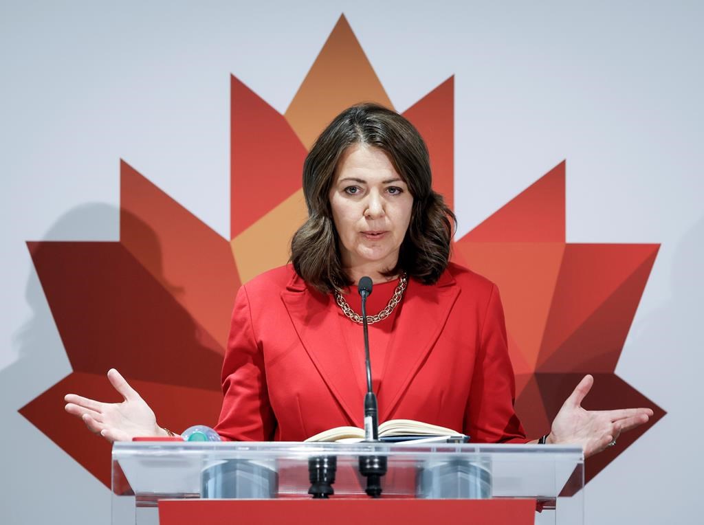 Alberta Premier Danielle Smith speaks to the media in Calgary, Monday, Sept. 18, 2023.