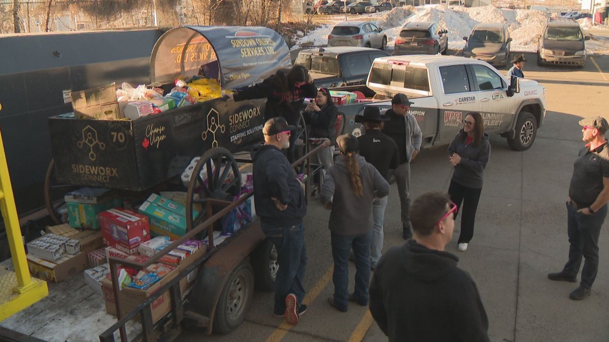 Truck and trailer parked out front of the Calgary Food Bank.