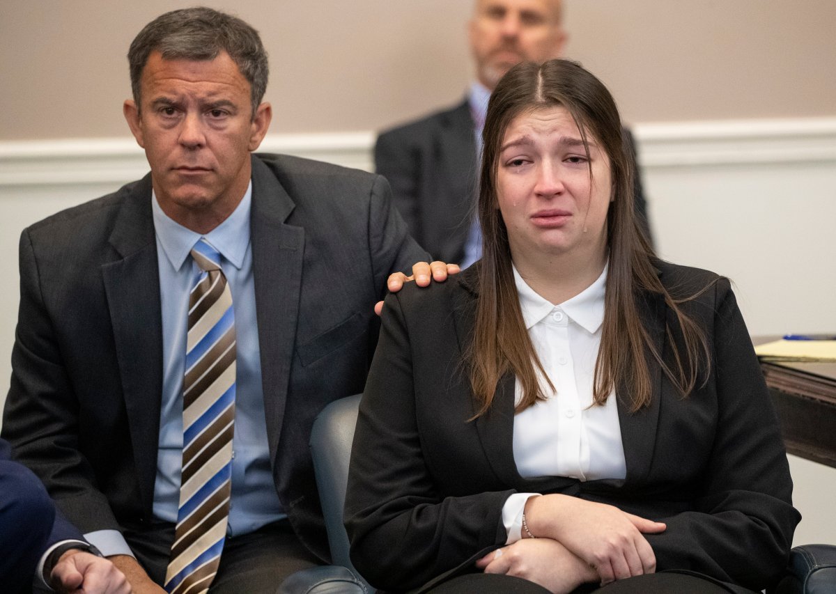 Tears fall down the cheeks of Jamie Lee Komoroski as family members of Samantha Miller speak about Miller during the plea hearing for Komoroski at Charleston County Court, Monday, Dec. 2, 2024, in Charleston, S.C.