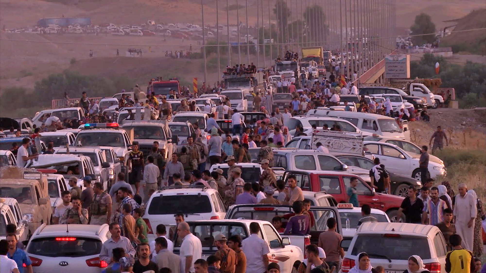 Yazidis flee to Erbil, Iraq after ISIS attacked the towns of Sinjar and Zunmar, Aug. 3, 2014. (AP Photo via AP video)