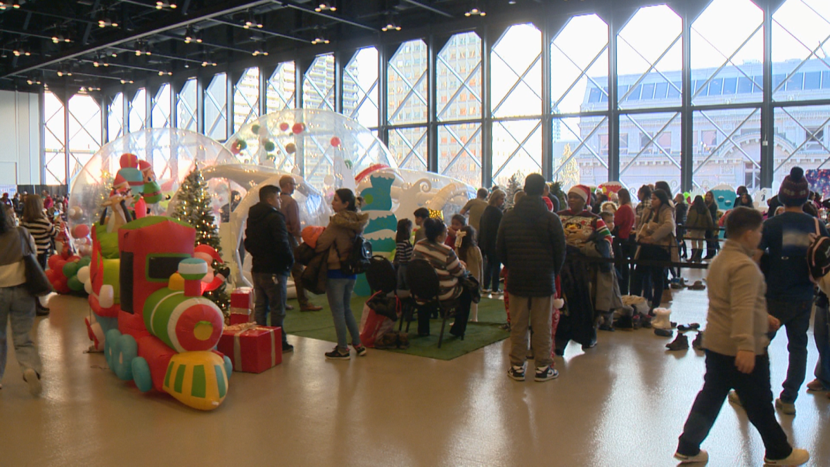 Calgarians enjoy the Calgary Firefighters toy event