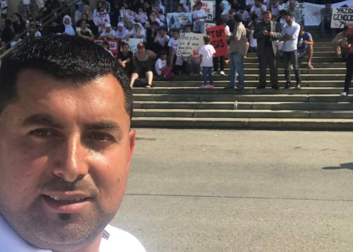 Hadji Hesso, executive director of Yazidi Association of Manitoba, at demonstration at Manitoba legislature, 2018.