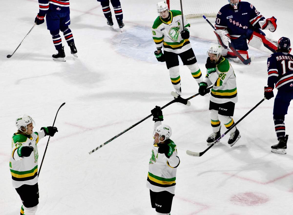 Easton Cowan of the London Knights celebrates his first period goal that extended his point streak ton 56 consecutive regular season games.