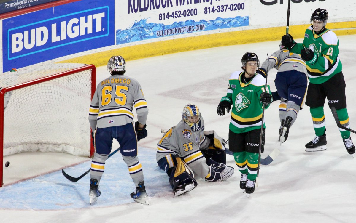 Evan Van Gorp celebrates his 10th goal of the season as he scores on Charlie Burns of the Erie Otters in a game played on Dec. 18, 2024.