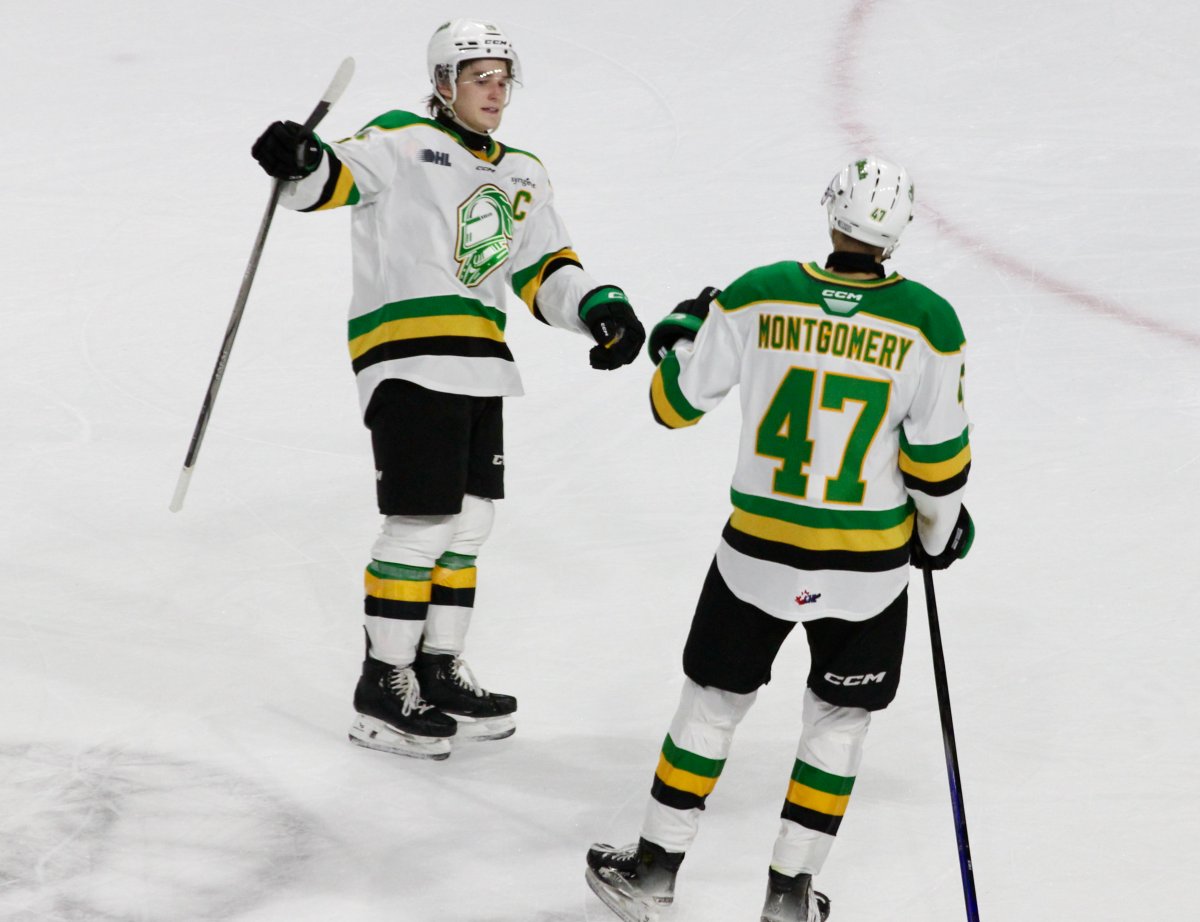 Blake Montgomery (47) and Denver Barkey (86) of the London Knights celebrate Montgomery's first period goal in a London victory over the Sarnia Sting on Dec. 20. 2024.