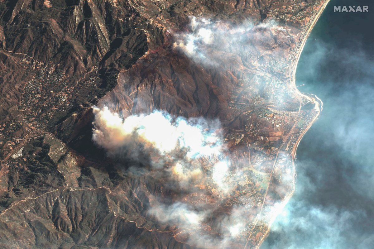 This satellite images provided by Maxar Technologies shows smoke rising from the Franklin Fire in Malibu, Calif., Tuesday, Dec. 10, 2024.