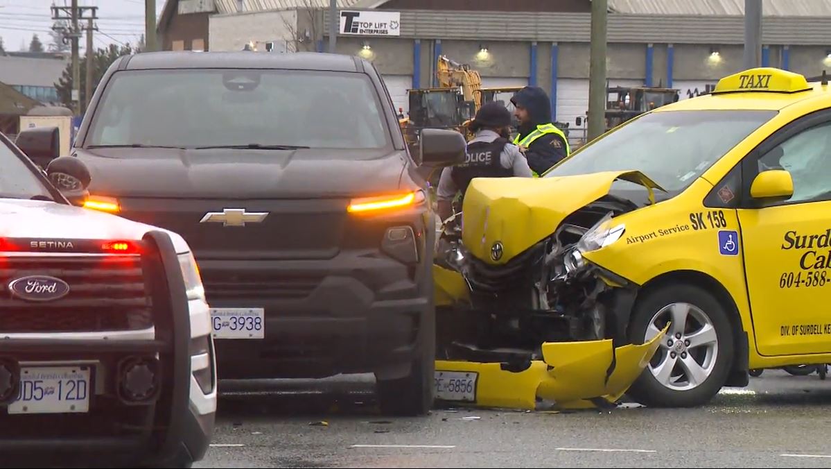 A fatal two car crash in Surrey involving a taxi. 