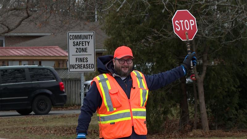 Clayton Ross, a crossing guard at St. Paul Catholic School, wins national recognition for his dedication, creating safety and meaningful connections in Kingston.