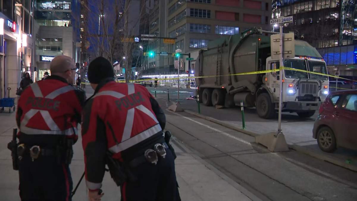 Calgary Police closed off several streets in downtown Calgary during the busy morning rush hour on Tuesday after a woman was hit by a garbage truck.