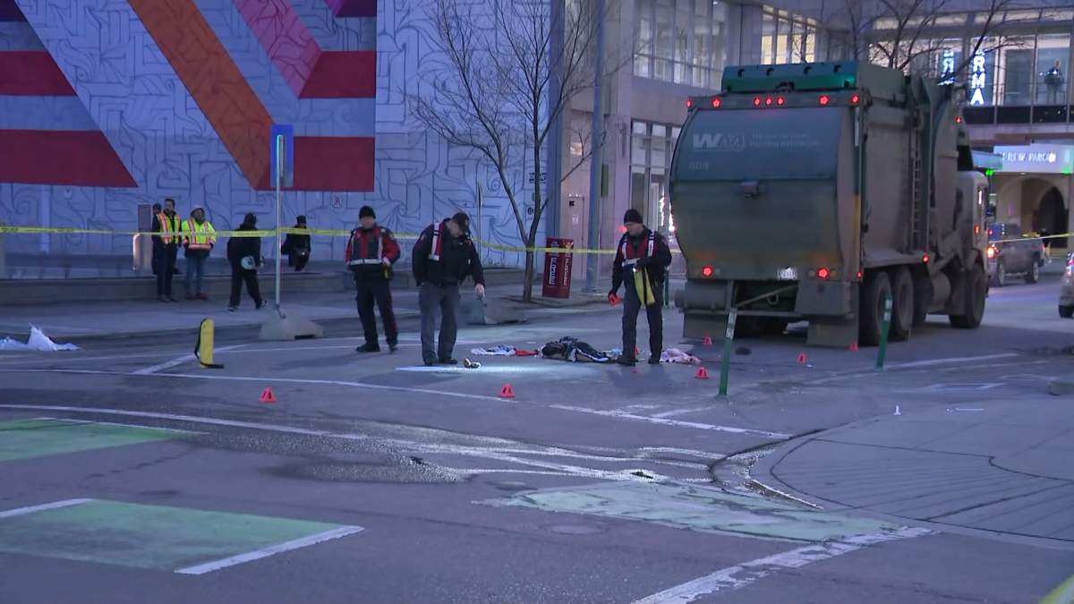 Calgary Police say a woman was taken to hospital in life-threatening condition after being hit by a garbage truck in downtown Calgary early Tuesday morning (Dec. 10, 2024)