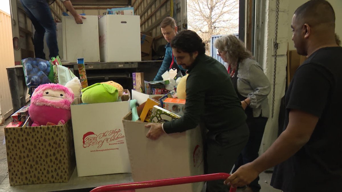 Volunteers will help The Magic of Christmas sort through the truckloads of donations made during Global Calgary's Morning of Giving before they are delivered to families in need on Christmas Eve.