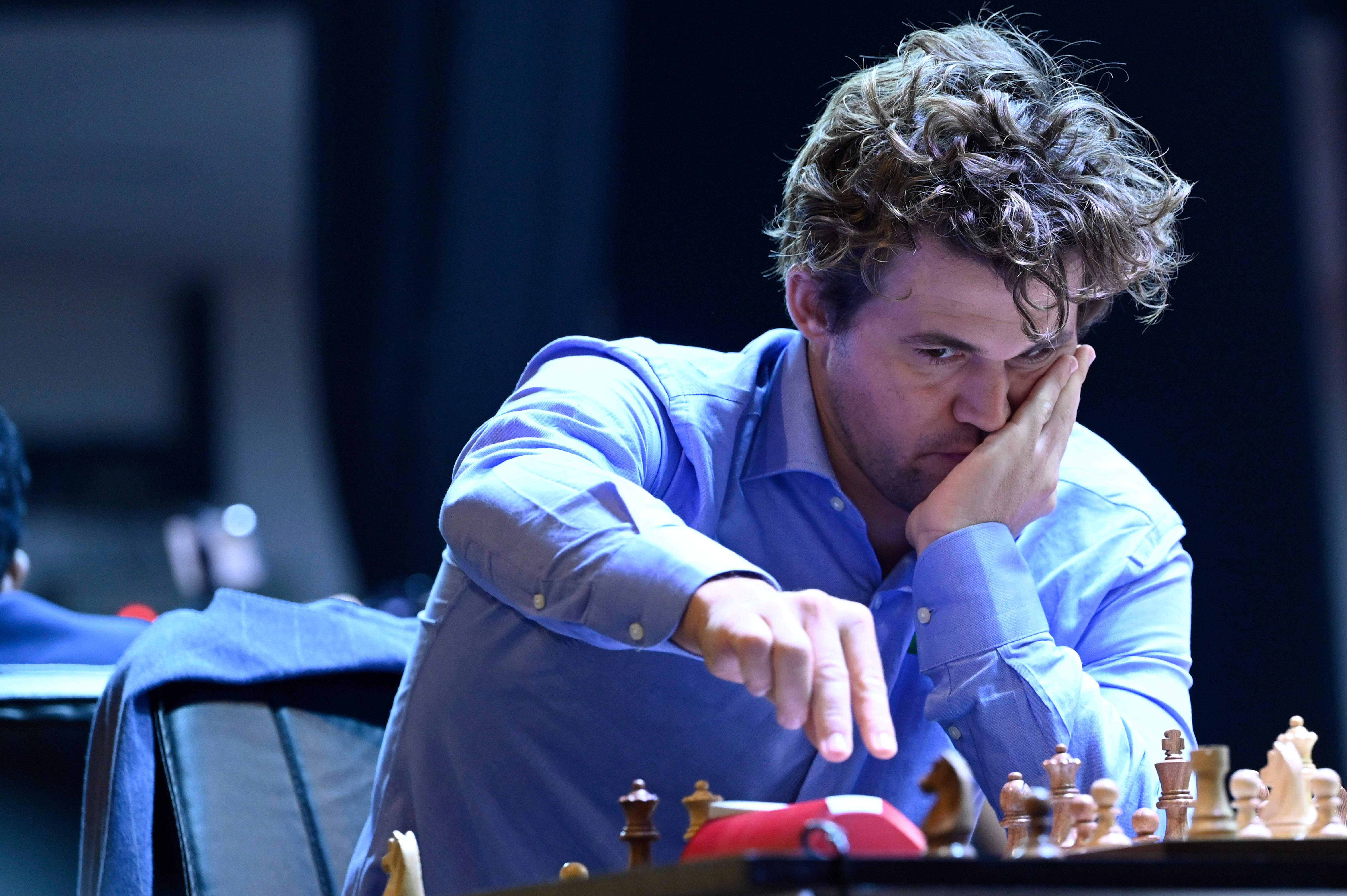 Chess grandmaster returns to play after dispute over jeans resolved - National | Globalnews.ca Chess grandmaster returns to play after dispute over jeans resolved - National | Globalnews.ca