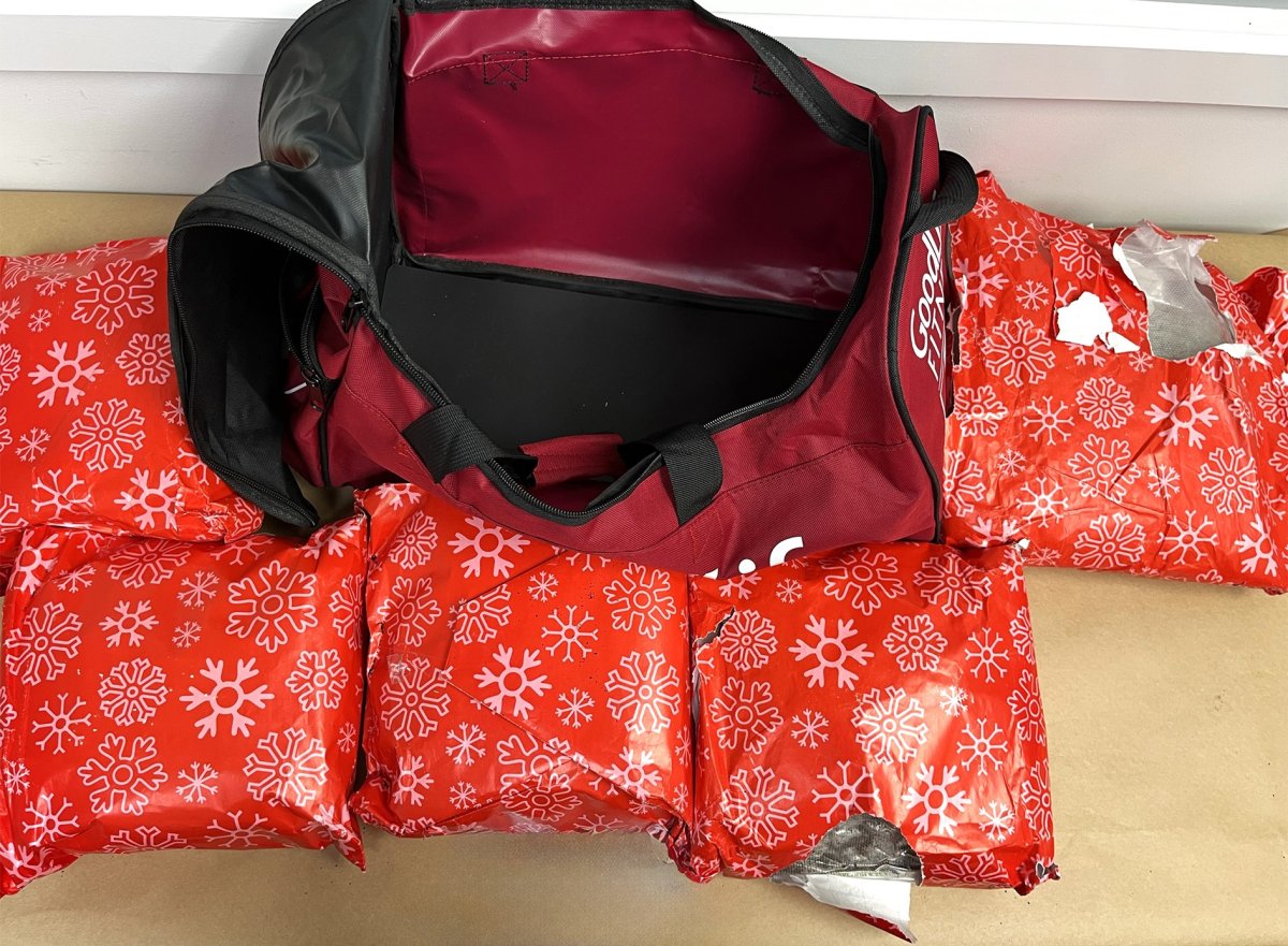 New Zealand Customs shared photos of the meth that had been wrapped in Christmas wrapping paper.