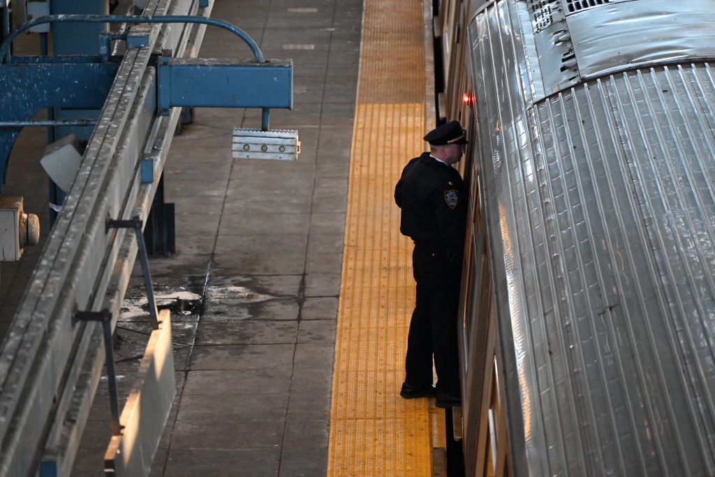 Police investigate at the Coney Island-Stillwell Avenue Station in Brooklyn after a woman aboard a subway car was set on fire and died in New York, United States on December 22, 2024.