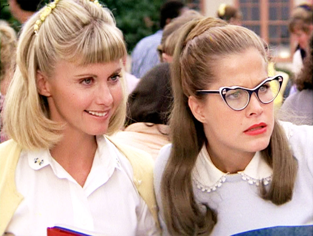 Seen here from left, Olivia Newton-John as Sandy Olsen and Susan Buckner (wearing cat's eyes glasses) as Patty Simcox in 'Grease.'